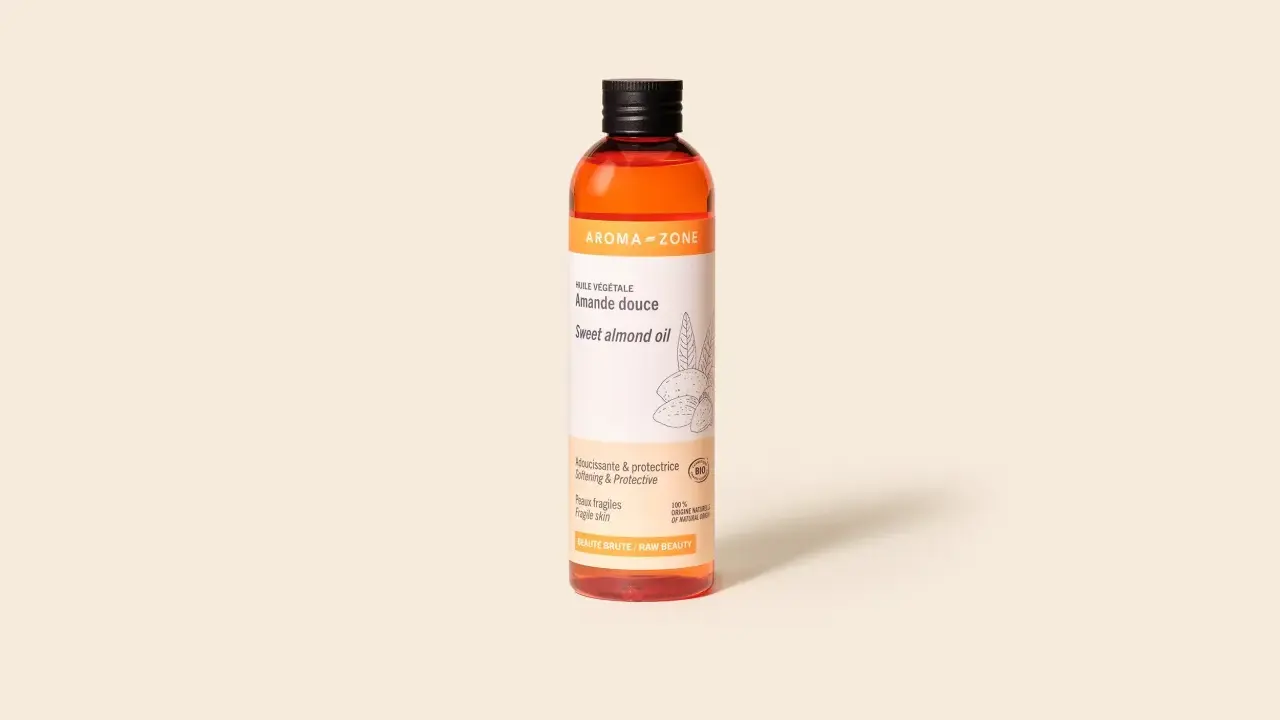Flacone di olio di mandorle dolci Aroma-Zone, ideale per pelli fragili. Scopri i benefici dell'olio di mandorle per la tua pelle.