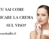 Donna con crema viso in mano, testo: "TU SAI COME APPLICARE LA CREMA SUL VISO?". Scopri il modo corretto.